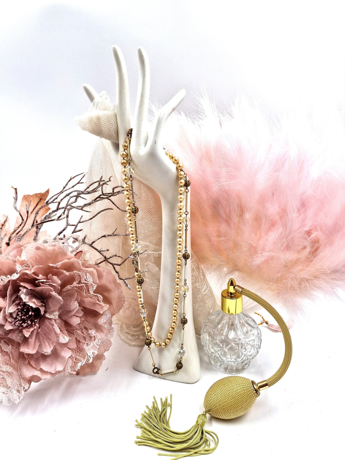 Stunning cut crystals glass necklace together with antique white glass simulated pearl necklace