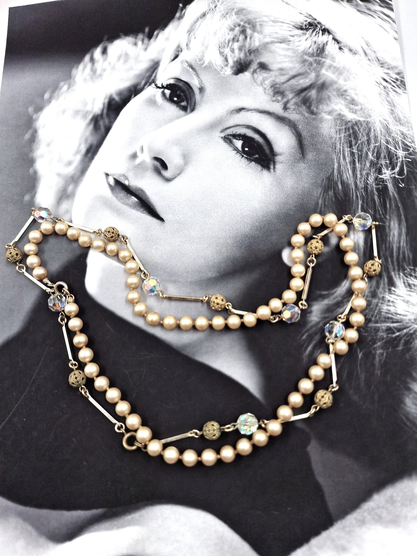Stunning cut crystals glass necklace together with antique white glass simulated pearl necklace